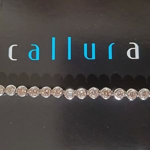 Callura champagne crystal tennis bracelet. NEW